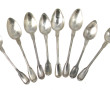 8 petites cuillères mêlées en argent, mo