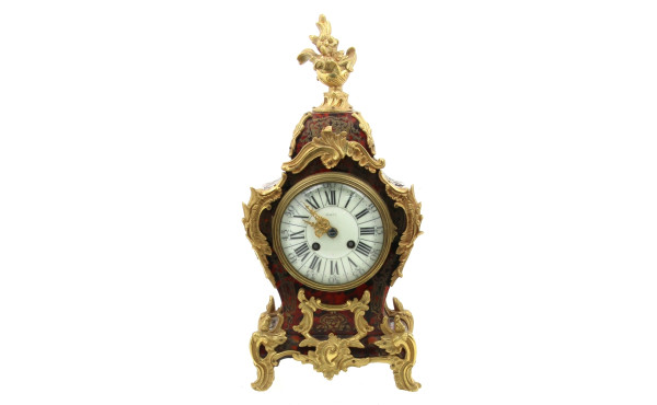 Pendule cartel de style Louis XV en bron