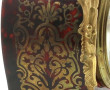 Pendule cartel de style Louis XV en bron