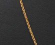 Chaîne en or jaune 18 cts, poinçon tête 