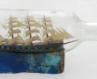 Navire en bouteille toutes voiles dehors