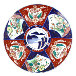 JAPON - Grand plat rond en porcelaine à 