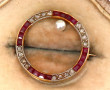 Petite broche circulaire ancienne en or 