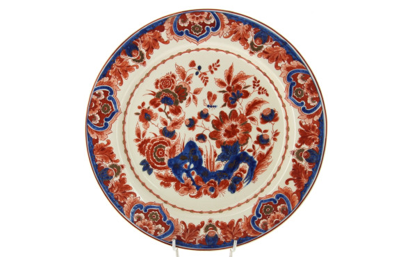 DELFT - Plat rond en faïence à décor dan