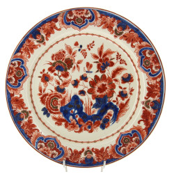 DELFT - Plat rond en faïence à décor dan