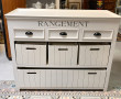 Meuble de rangement blanc ouvrant à 3 ti