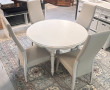 Table ronde blanche avec 2 allonges et 4