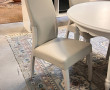Table ronde blanche avec 2 allonges et 4