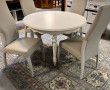 Table ronde blanche avec 2 allonges et 4