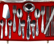 Ménagère en inox comprenant 12 couverts,