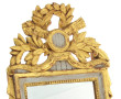 Miroir en bois sculpté et doré dans le g