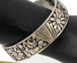 Bracelet jonc ouvrant en argent ajouré à