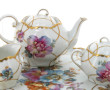 Tête à tête en porcelaine blanche et or 