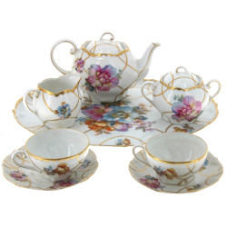 Tête à tête en porcelaine blanche et or 