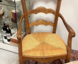 Fauteuil paillé en bois fruitier (bel ét