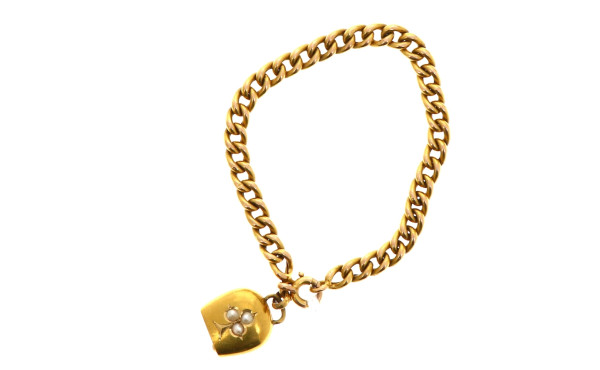 Gourmette de bébé avec breloque en forme