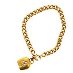 Gourmette de bébé avec breloque en forme