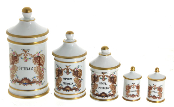 Suite de 5 pots à pharmacie en porcelain